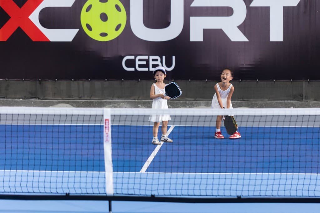 Kids playing pickleball at X Court Cebu