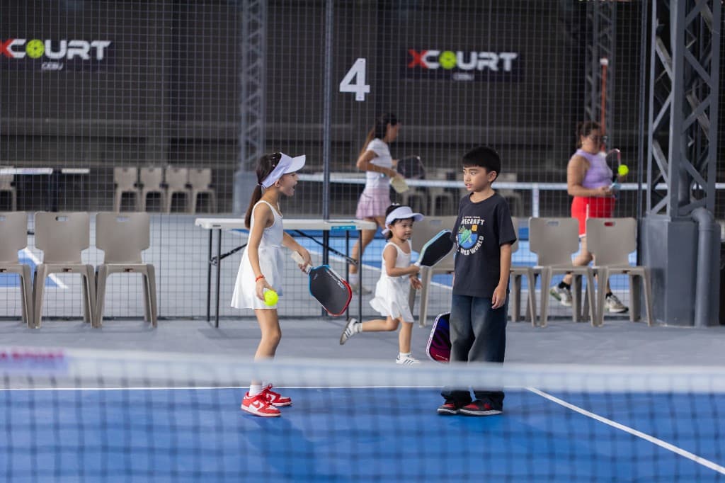 Kids playing pickleball at X Court Cebu